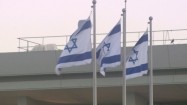 Trzy flagi Izraela powiewające na wietrze