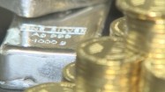 Złote monety okolicznościowe i sztabki srebra