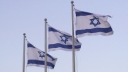 Trzy flagi Izraela na wietrze